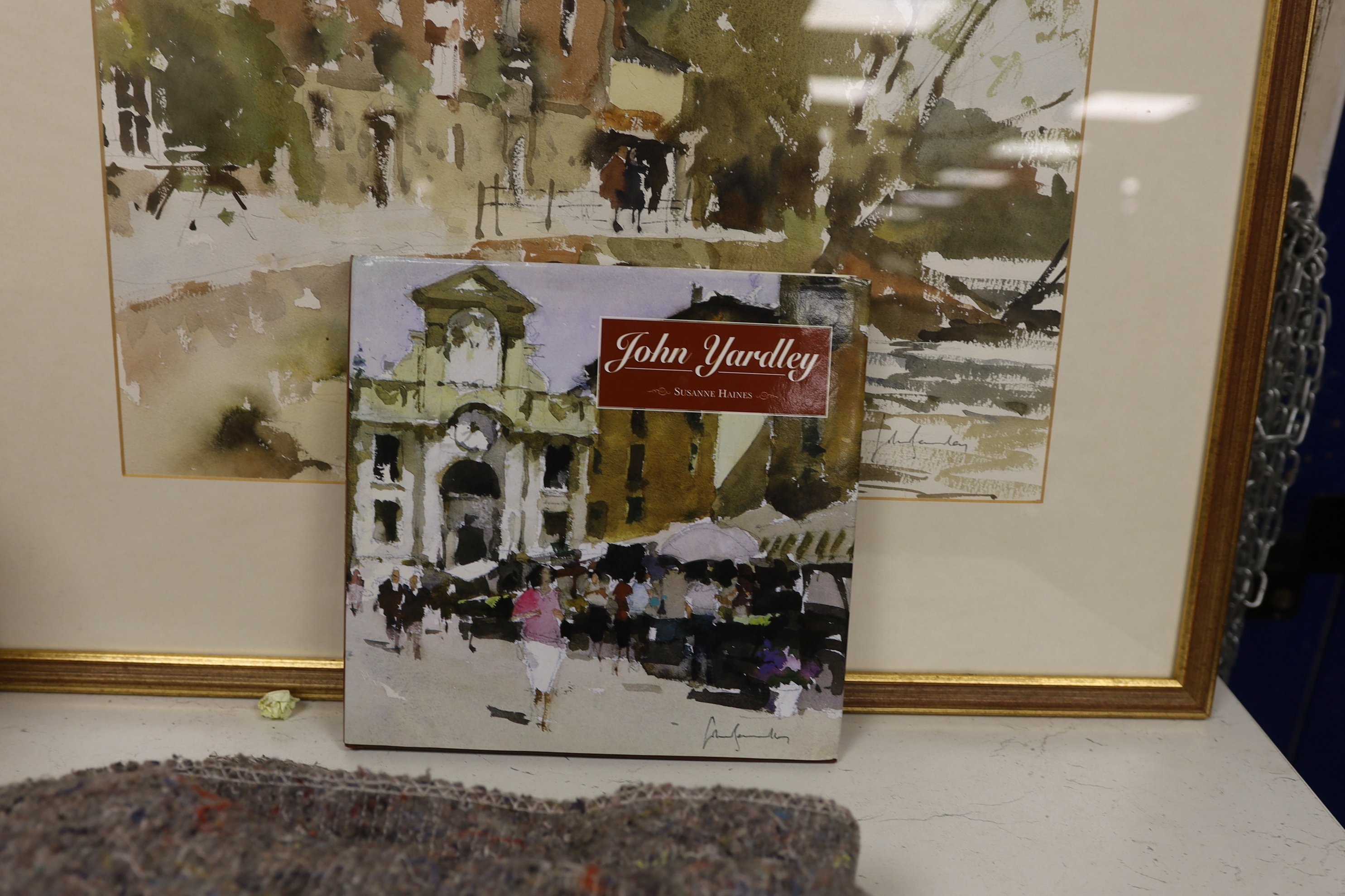 John Yardley, R.I. (b.1933), watercolour, Riverside houses, signed, 36 x 46cm, together with a copy of John Yardley by Susanne Haines